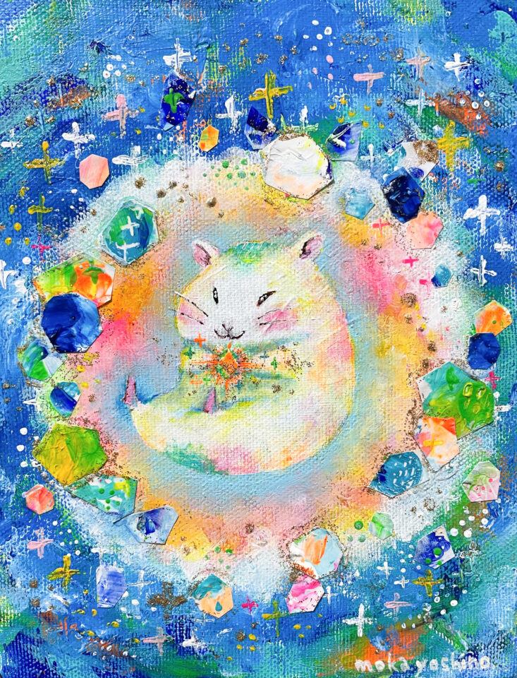 光に包まれているハムスターの画像