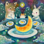 月のケーキを食べている動物